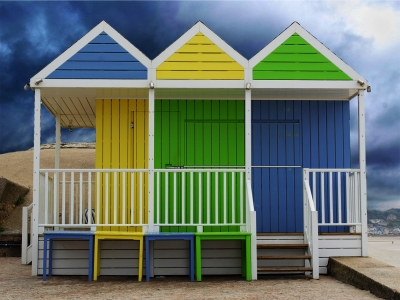 Beach-huts on Jersey
Bright beach huts with blues echoed in the approaching stormy clouds.
Keywords: Beach-huts on Jersey